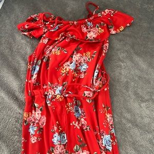 off the shoulder red dress with flower print.
